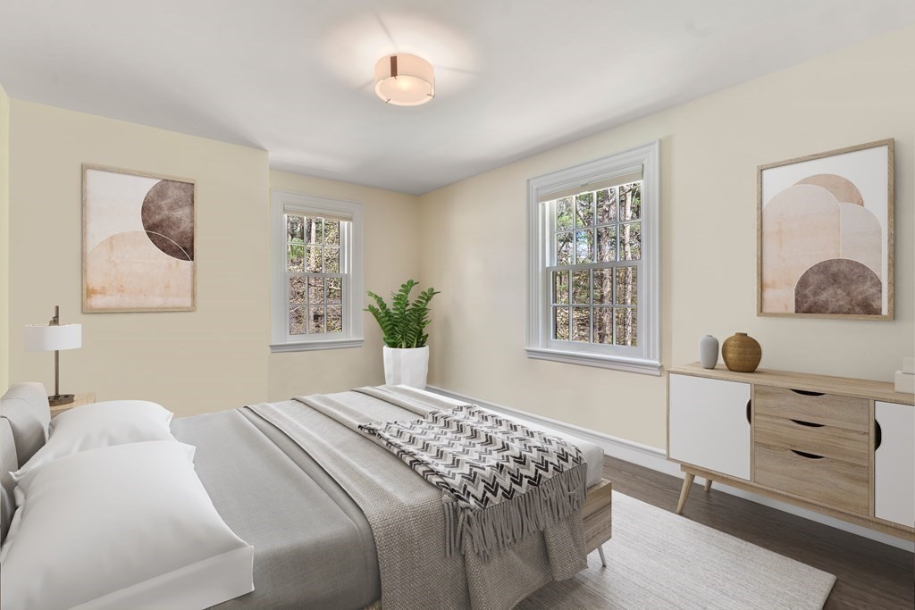 86 Concord Road Weston, MA 02493 - Photo 13 of 24 a bedroom with a bed and a window