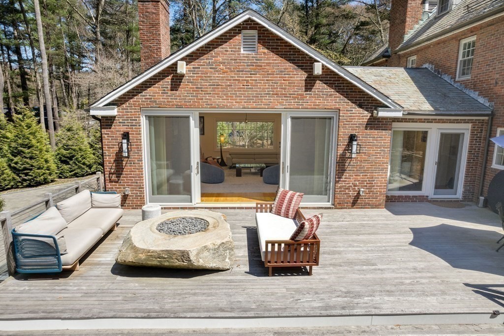 86 Concord Road Weston, MA 02493 - Photo 18 of 24 a view of a house with a patio
