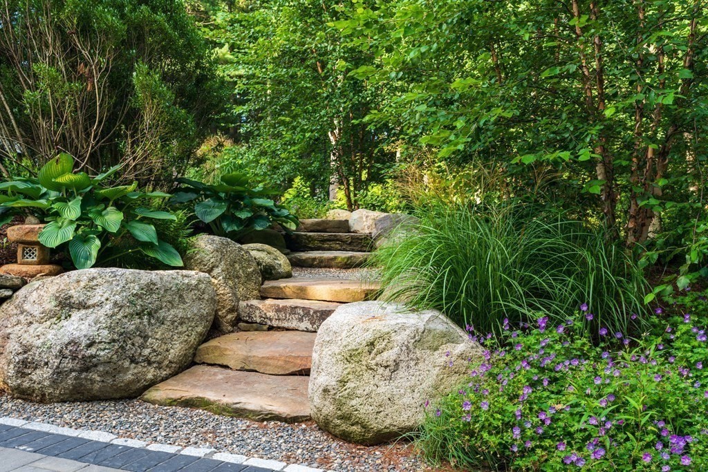86 Concord Road Weston, MA 02493 - Photo 3 of 24 a view of a couches in a backyard