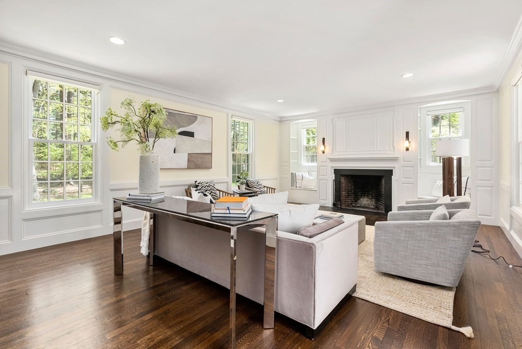 86 Concord Road Weston, MA 02493 - Photo 8 of 24 a living room with stainless steel appliances granite countertop furniture and a fireplace