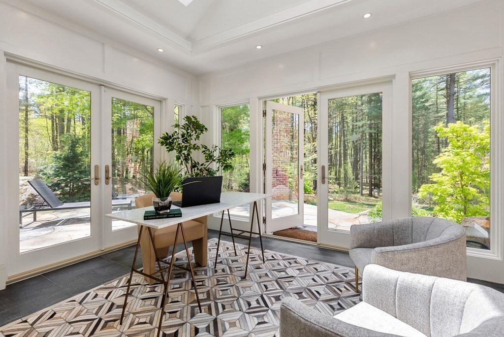 86 Concord Road Weston, MA 02493 - Photo 10 of 24 a living room with furniture and a potted plant