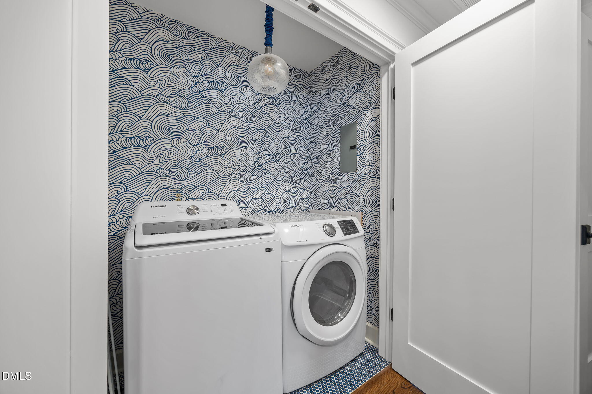 8805 Mourning Dove Road Raleigh, NC 27615 - Photo 23 of 55 a utility room with dryer and washer