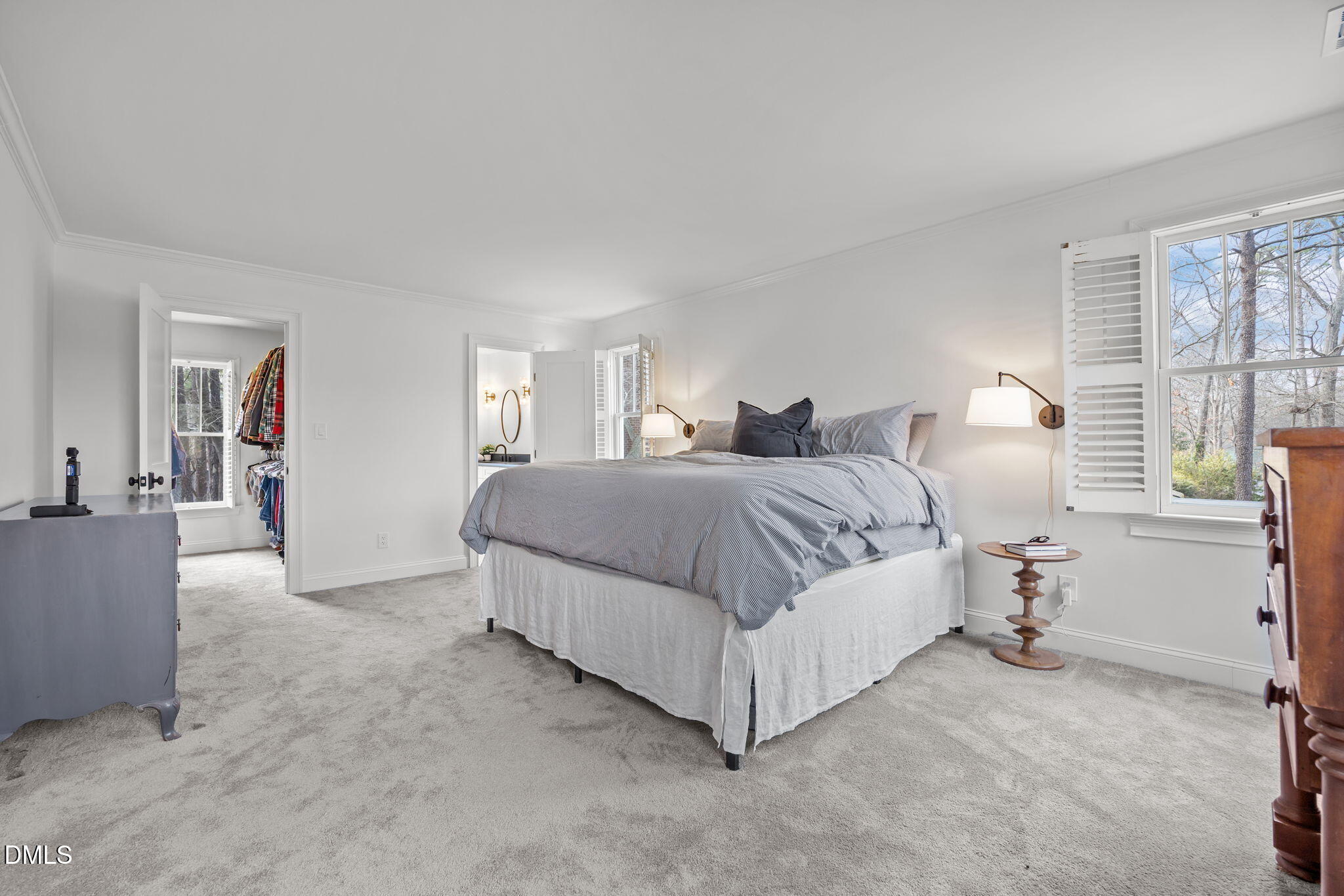 8805 Mourning Dove Road Raleigh, NC 27615 - Photo 29 of 55 a spacious bedroom with a bed and a window