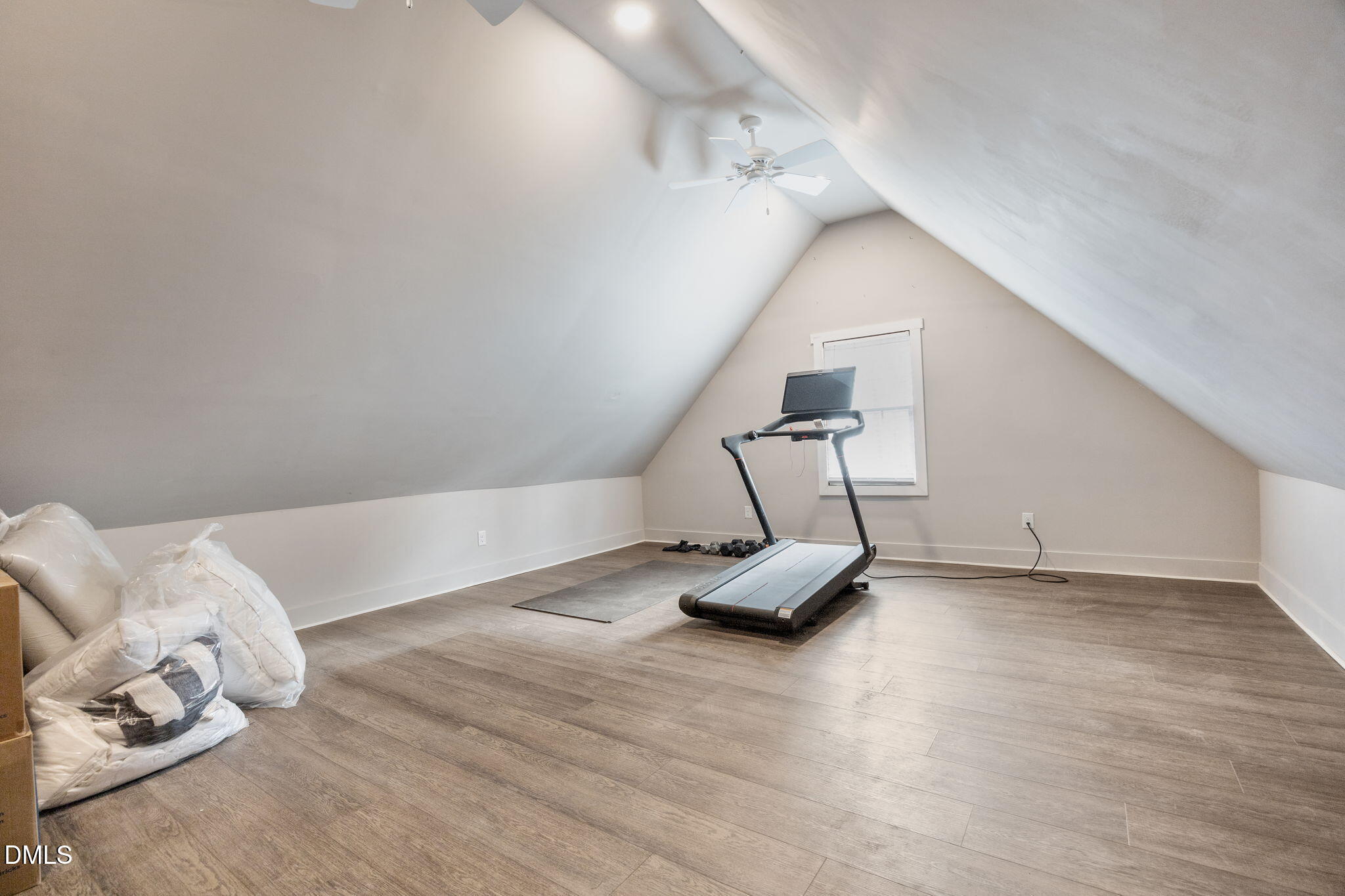8805 Mourning Dove Road Raleigh, NC 27615 - Photo 33 of 55 a view of a room with wooden floor