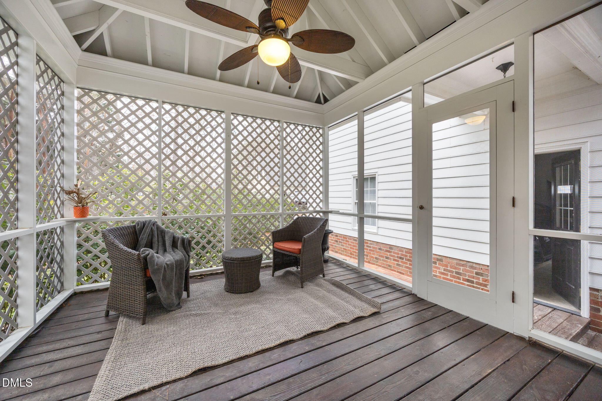 8805 Mourning Dove Road Raleigh, NC 27615 - Photo 36 of 55 a view of a dining room with furniture wooden floor and chandelier