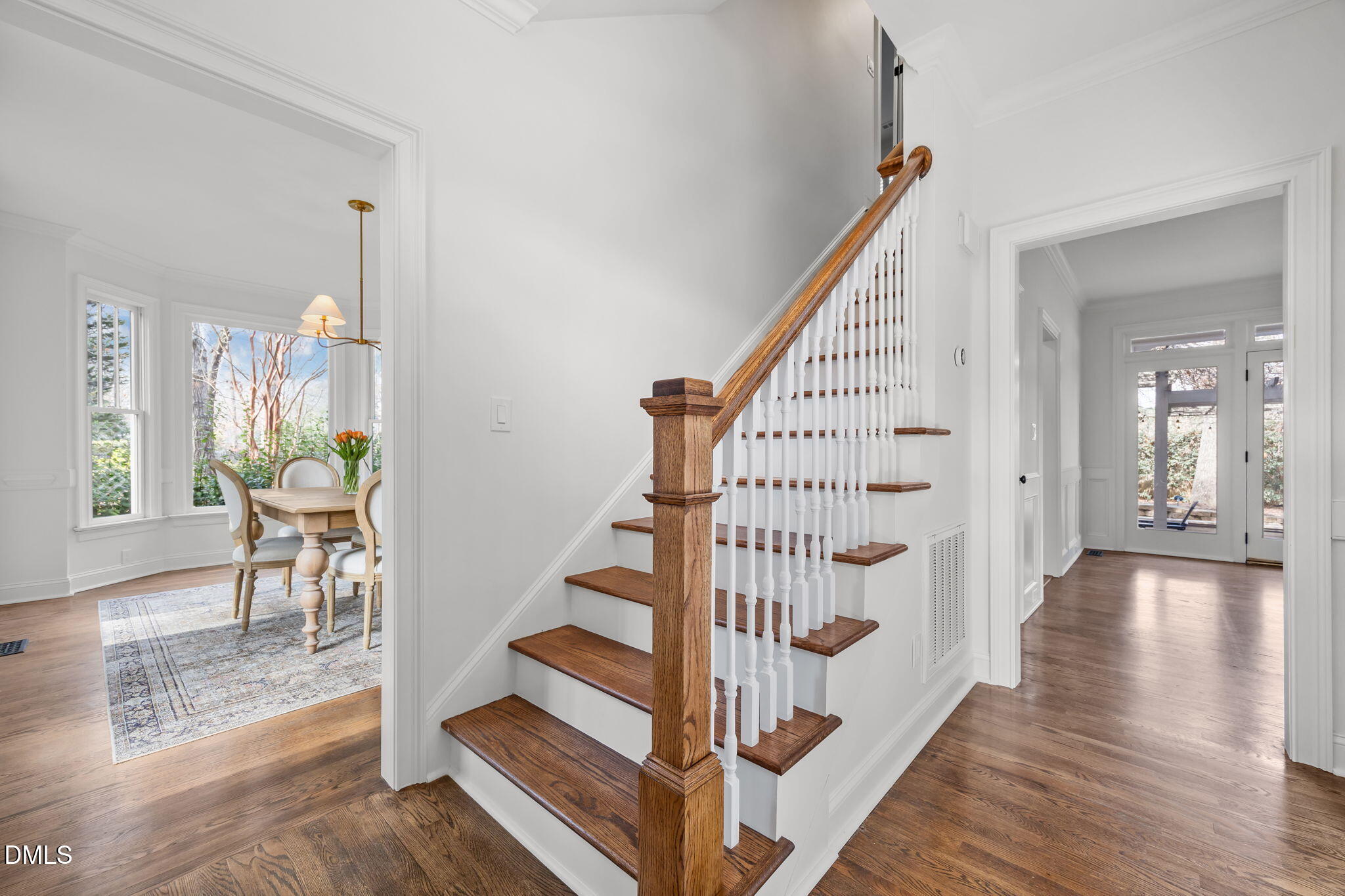 8805 Mourning Dove Road Raleigh, NC 27615 - Photo 3 of 55 a view of entryway and hall with wooden floor