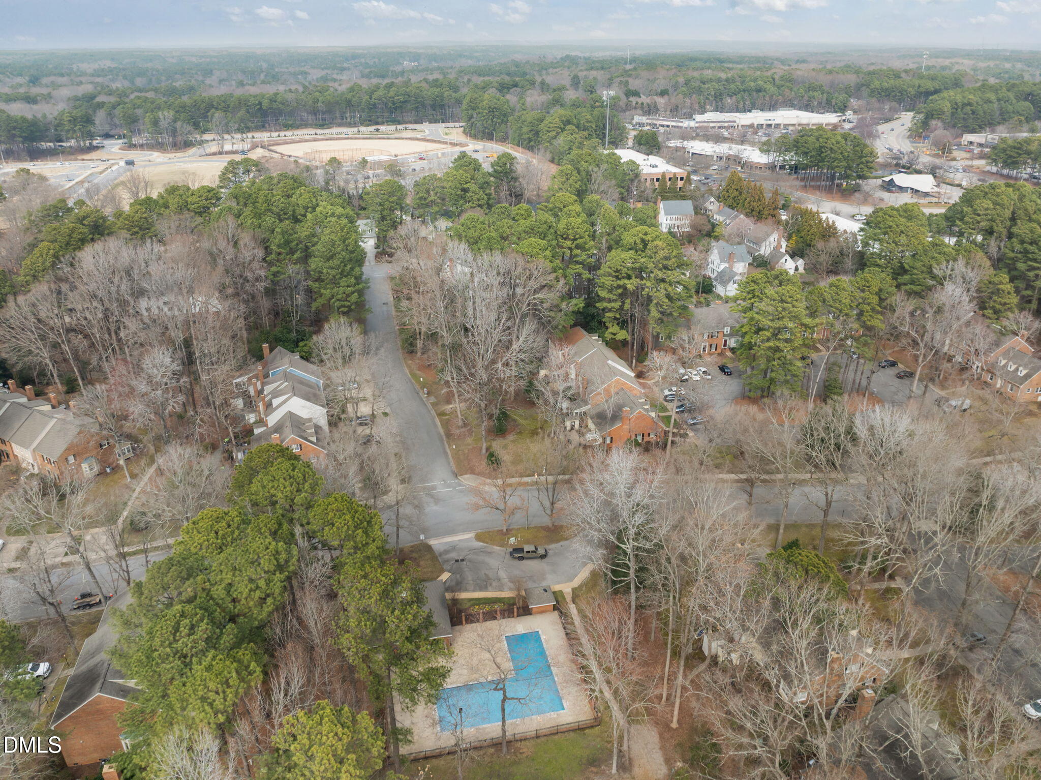 8805 Mourning Dove Road Raleigh, NC 27615 - Photo 50 of 55 an aerial view of residential houses with outdoor space and trees