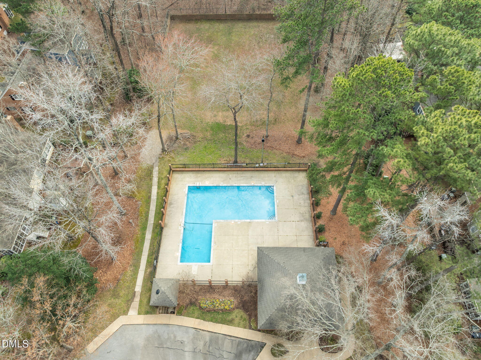 8805 Mourning Dove Road Raleigh, NC 27615 - Photo 51 of 55 front view of a brick house with a small yard