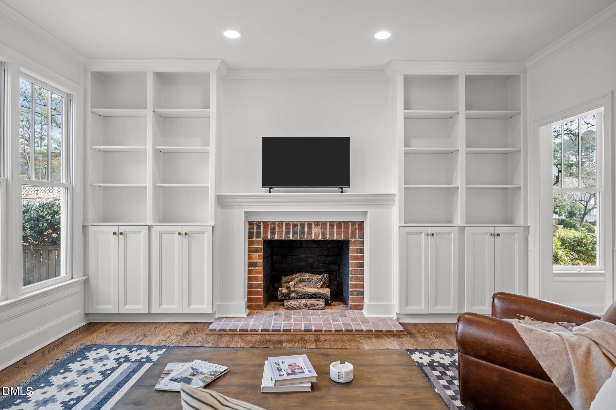 8805 Mourning Dove Road Raleigh, NC 27615 - Photo 7 of 55 a living room with furniture and a fireplace