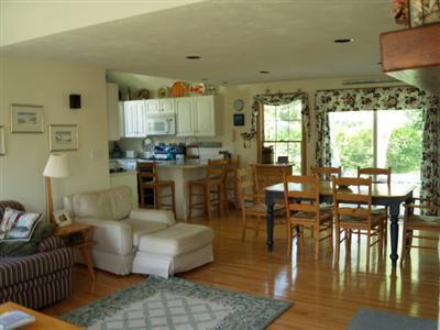 138 Mashnee Road Bourne, MA 02532 - Photo 4 of 15 a living room with furniture and a large window