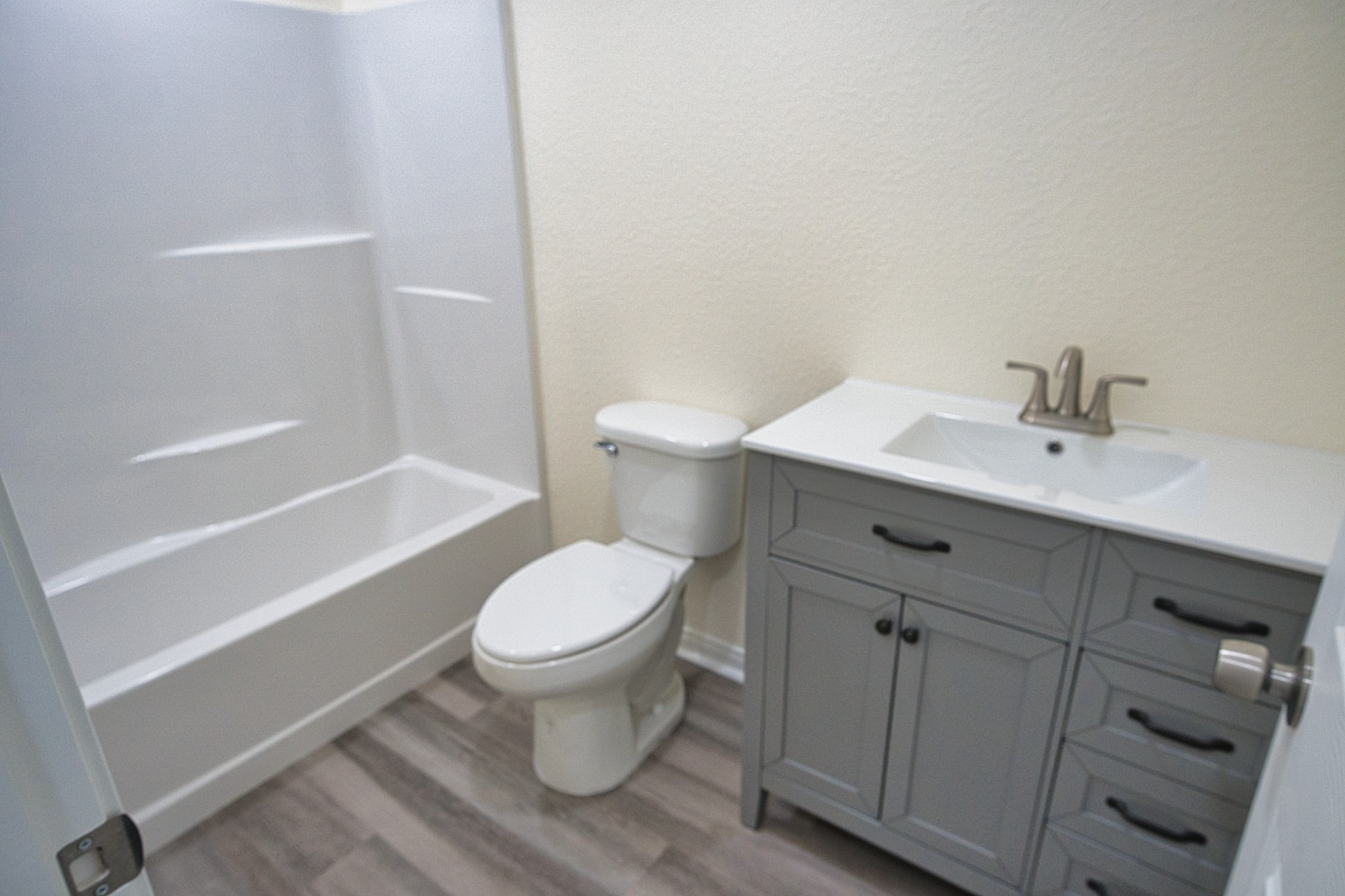 133 County Road 296 Sargent, TX 77414 - Photo 12 of 19 a bathroom with a sink toilet and vanity