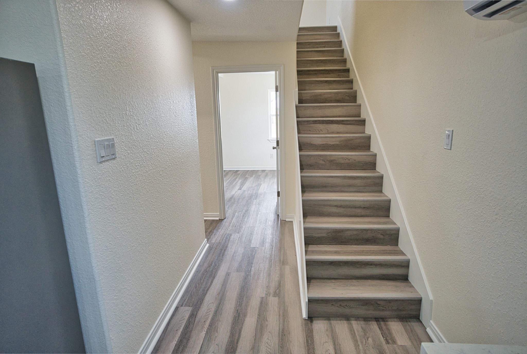 133 County Road 296 Sargent, TX 77414 - Photo 15 of 19 a view of entryway and gallery with wooden floor