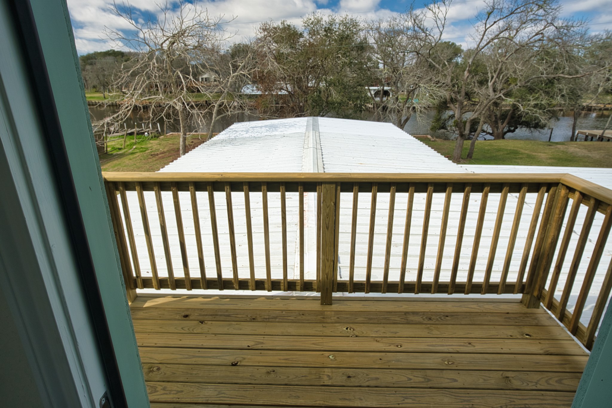 133 County Road 296 Sargent, TX 77414 - Photo 17 of 19 a view of outdoor space with deck