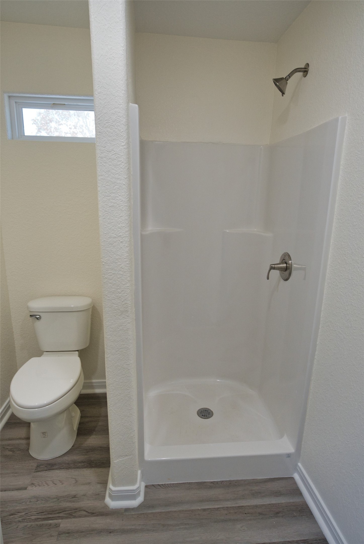 133 County Road 296 Sargent, TX 77414 - Photo 18 of 19 a bathroom with a toilet and a shower