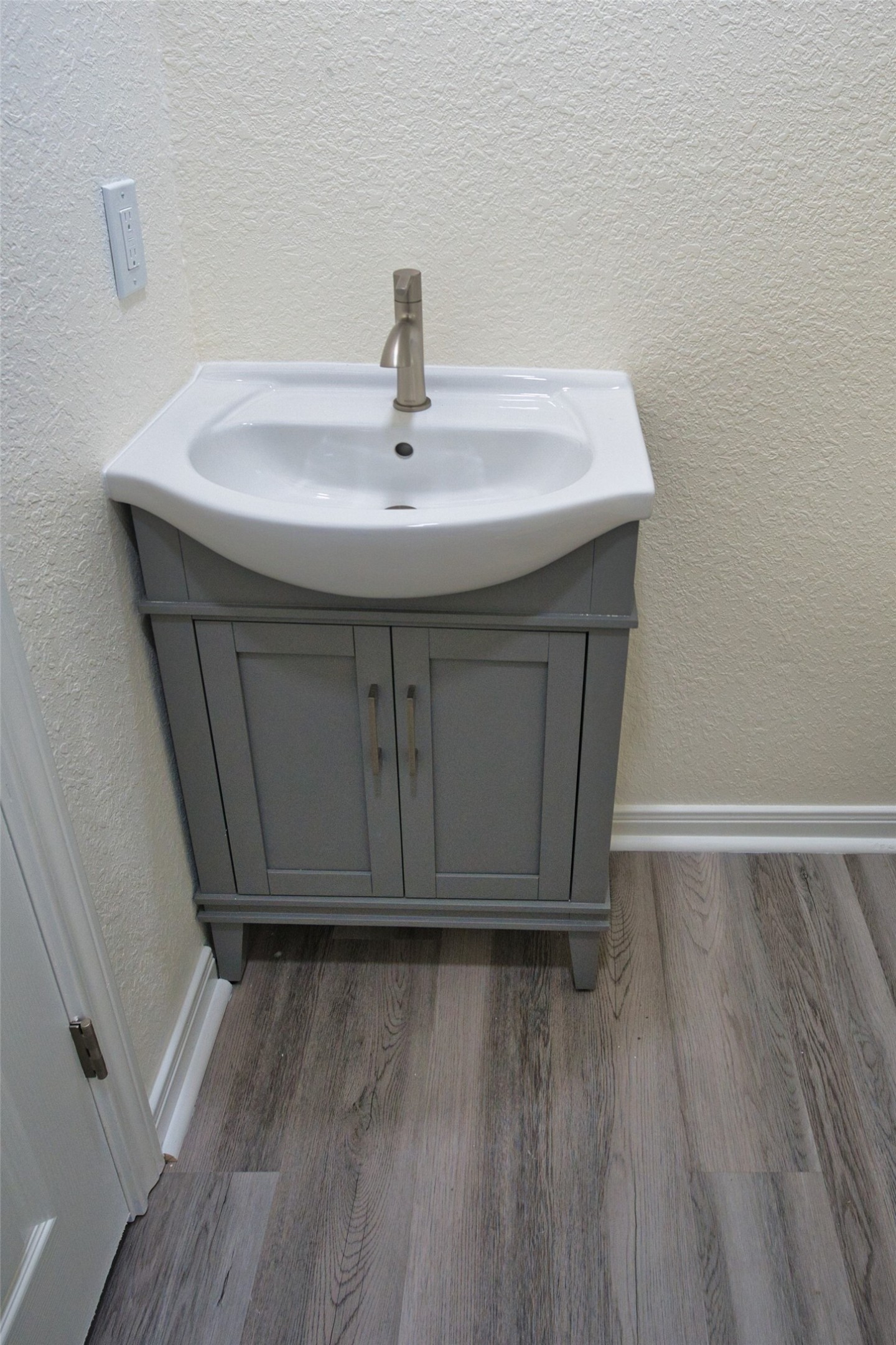 133 County Road 296 Sargent, TX 77414 - Photo 19 of 19 a bathroom with a sink and a mirror