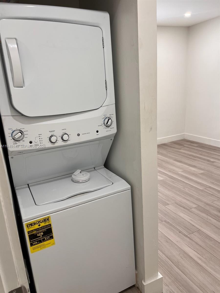 852 Southwest 13th Avenue, Unit 3 Miami, FL 33135 - Photo 11 of 20 a utility room with dryer and washer
