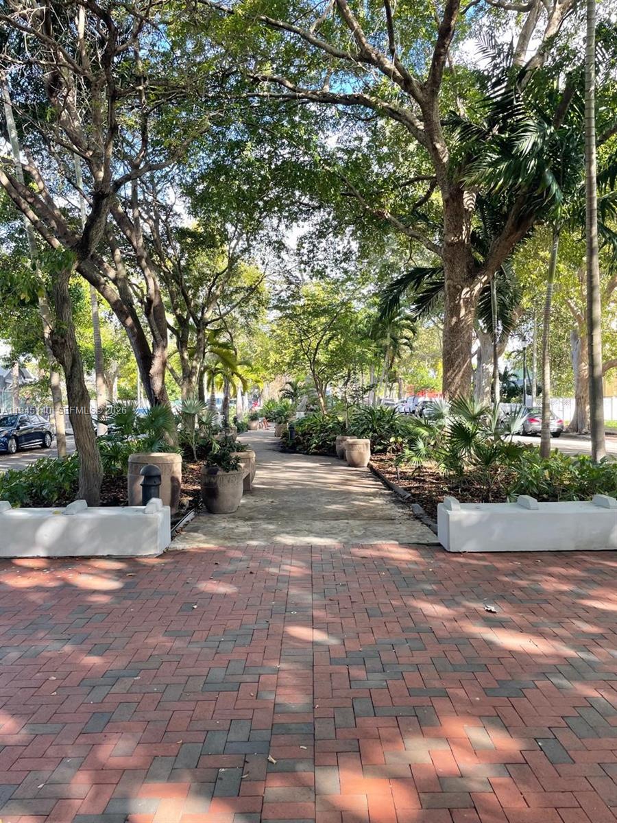 852 Southwest 13th Avenue, Unit 3 Miami, FL 33135 - Photo 16 of 20 a view of a park with benches and trees
