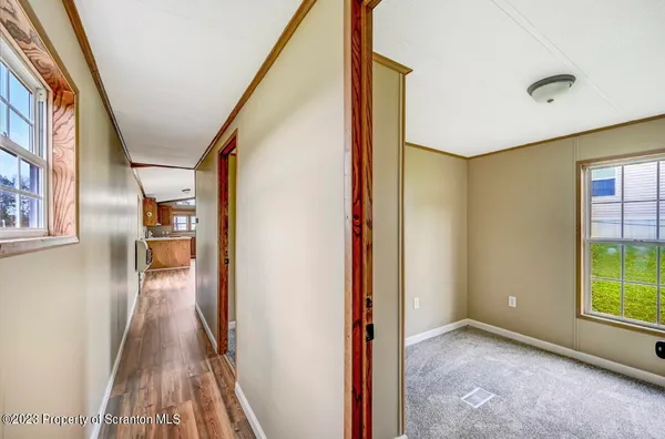 an empty room with windows