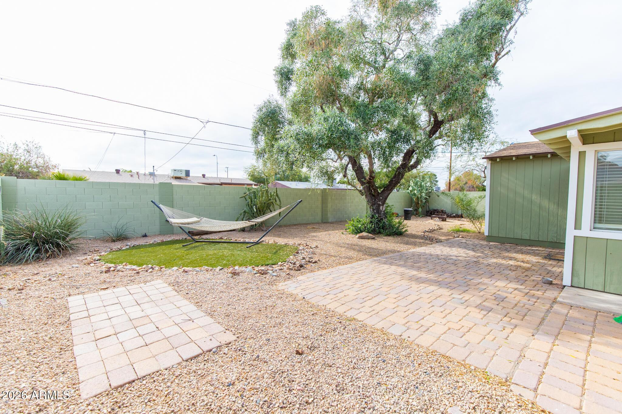 1029 West Elna Rae Street Tempe, AZ 85281 - Photo 19 of 20 a view of a back yard of the house