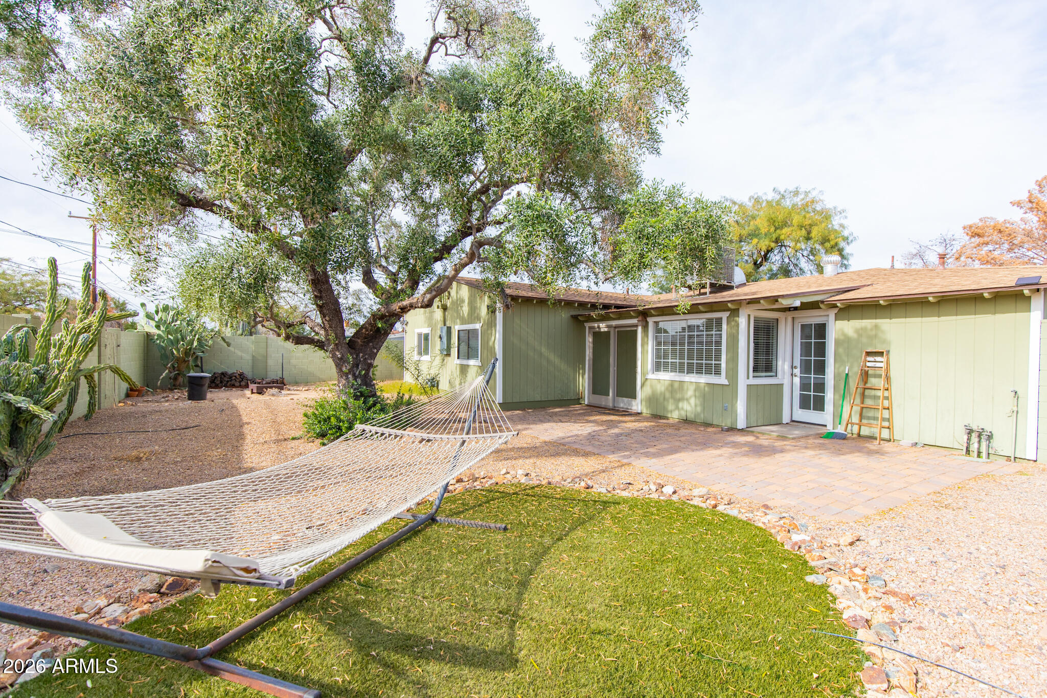1029 West Elna Rae Street Tempe, AZ 85281 - Photo 20 of 20 front view of a house with a yard