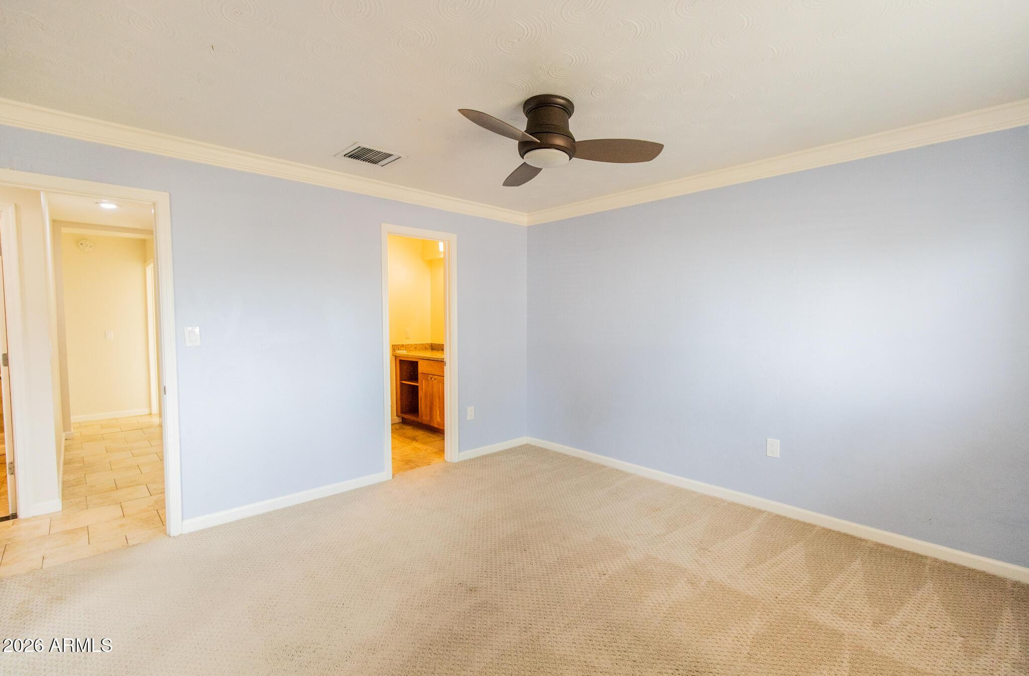 1029 West Elna Rae Street Tempe, AZ 85281 - Photo 10 of 20 a view of empty room with windows