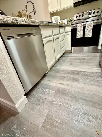 a lobby with furniture and a potted plant