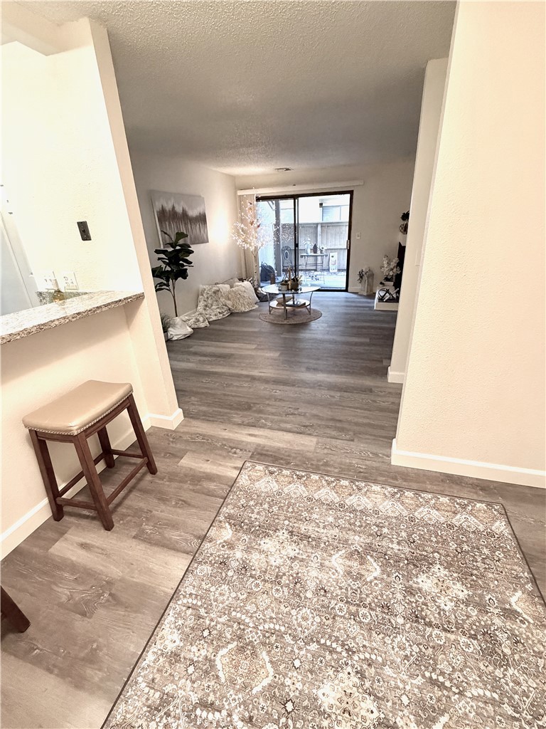 3400 Sullivan Court, Unit 105 Modesto, CA 95356 - Photo 20 of 46 a view of living room with furniture and wooden floor