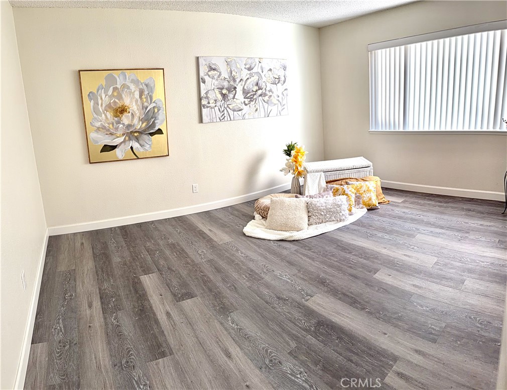 3400 Sullivan Court, Unit 105 Modesto, CA 95356 - Photo 36 of 46 a view of a dining room with wooden floor