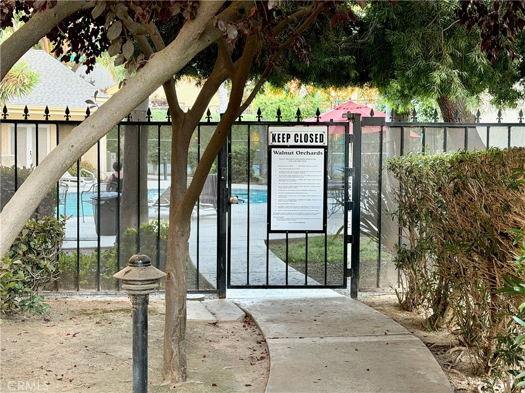 3400 Sullivan Court, Unit 105 Modesto, CA 95356 - Photo 42 of 46 a sign board with flower garden