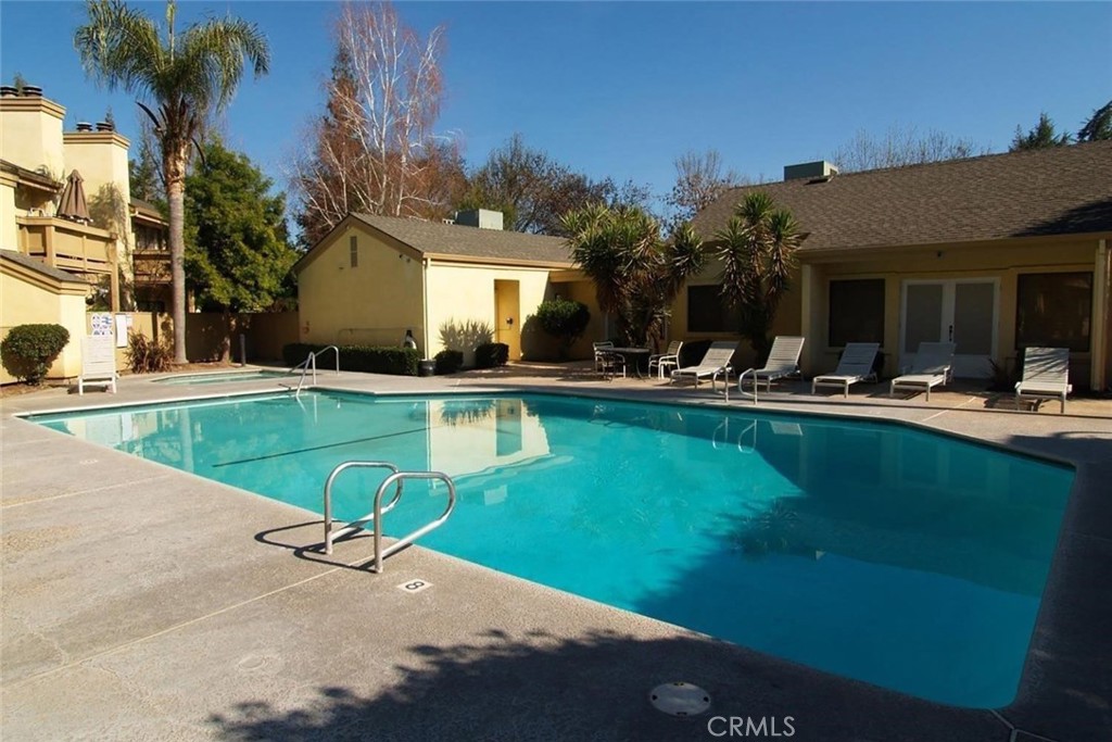 3400 Sullivan Court, Unit 105 Modesto, CA 95356 - Photo 45 of 46 a view of a house with swimming pool and sitting area