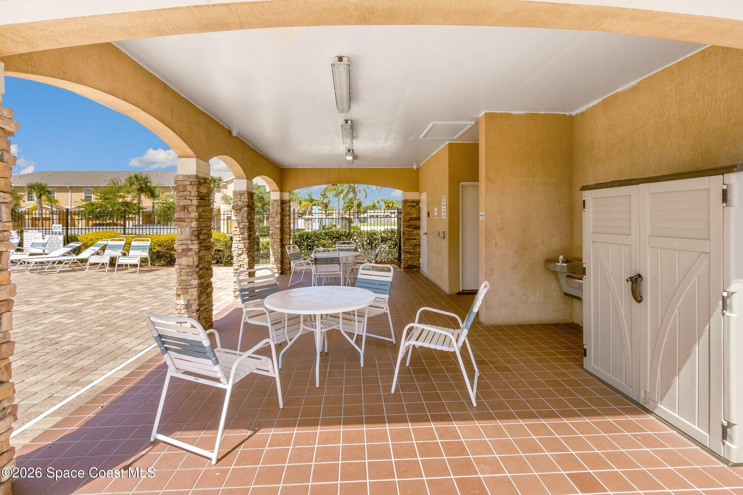 2780 Reston Street, Unit 105 Melbourne, FL 32935 - Photo 22 of 32 Clubhouse/Pool Area