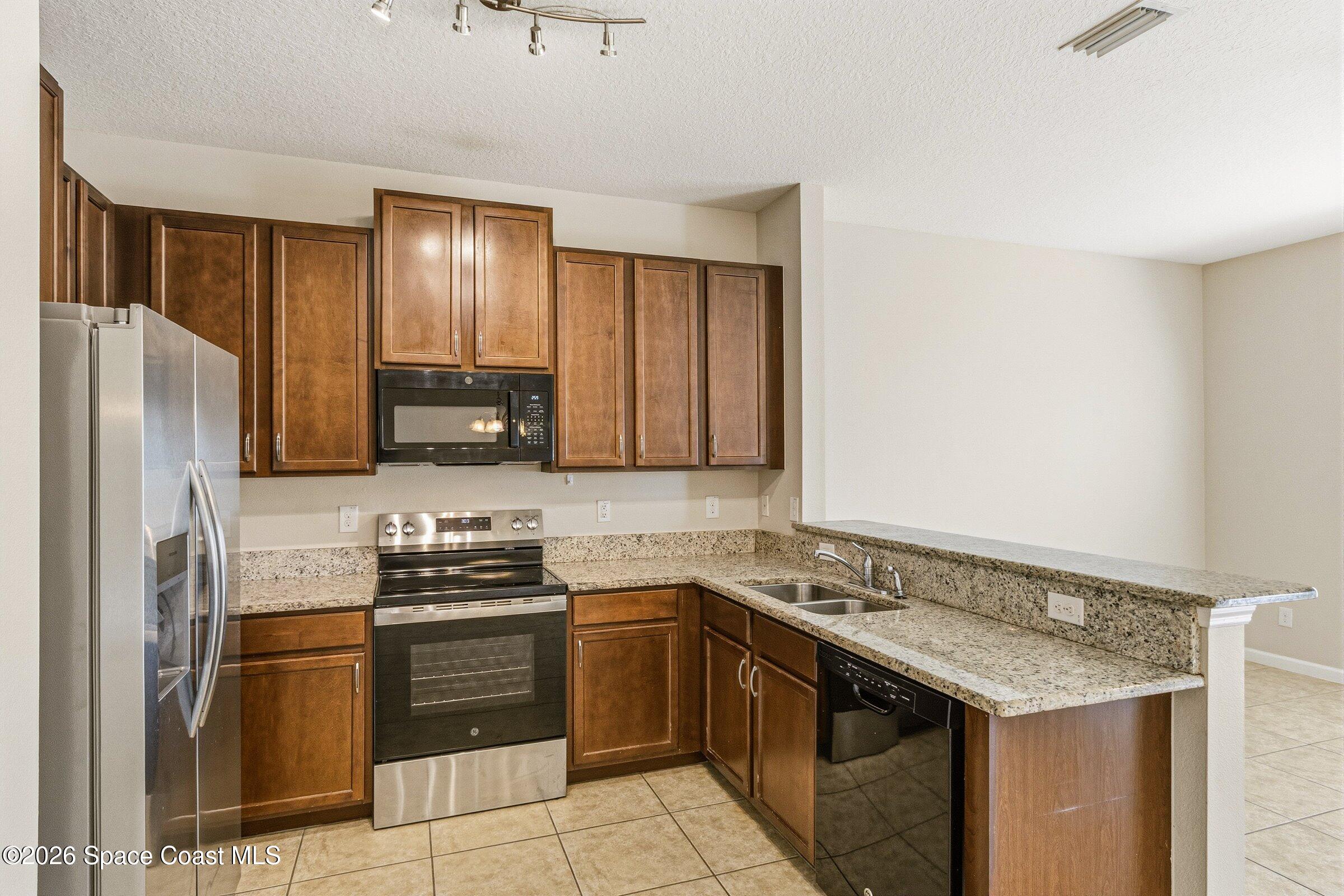 2780 Reston Street, Unit 105 Melbourne, FL 32935 - Photo 3 of 32 Kitchen