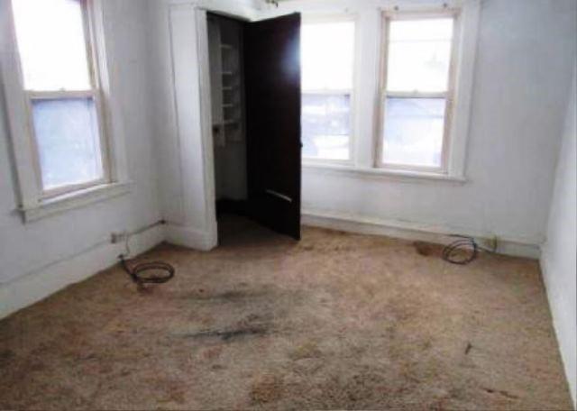 409 Vine Street Homestead, PA 15120 - Photo 8 of 10 an empty room with windows