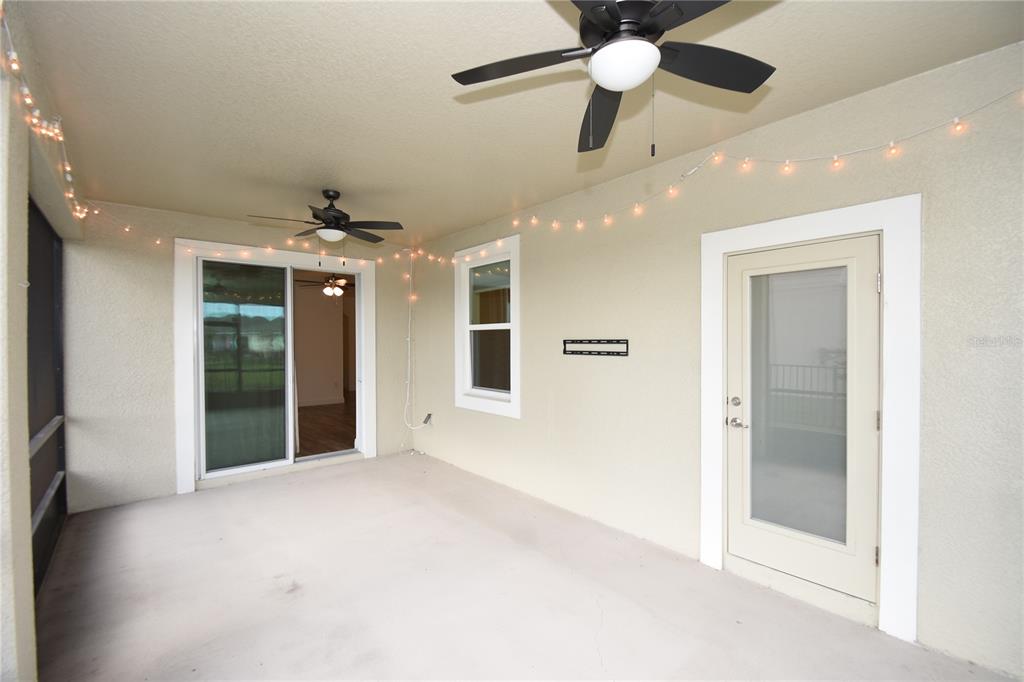 59 Oakleaf Way Palm Coast, FL 32137 - Photo 11 of 39 a view of an empty room with a ceiling fan