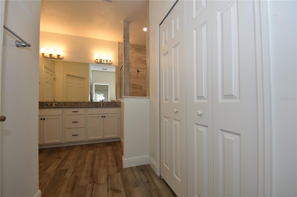 59 Oakleaf Way Palm Coast, FL 32137 - Photo 20 of 39 a bathroom with a shower and a mirror