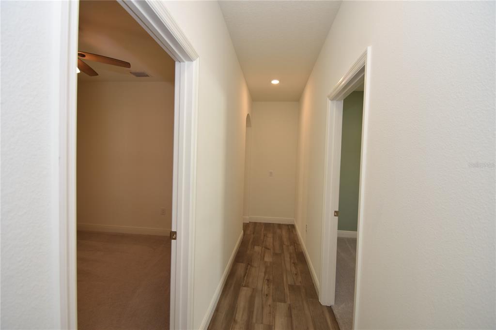 59 Oakleaf Way Palm Coast, FL 32137 - Photo 26 of 39 a view of a bathroom from the hallway