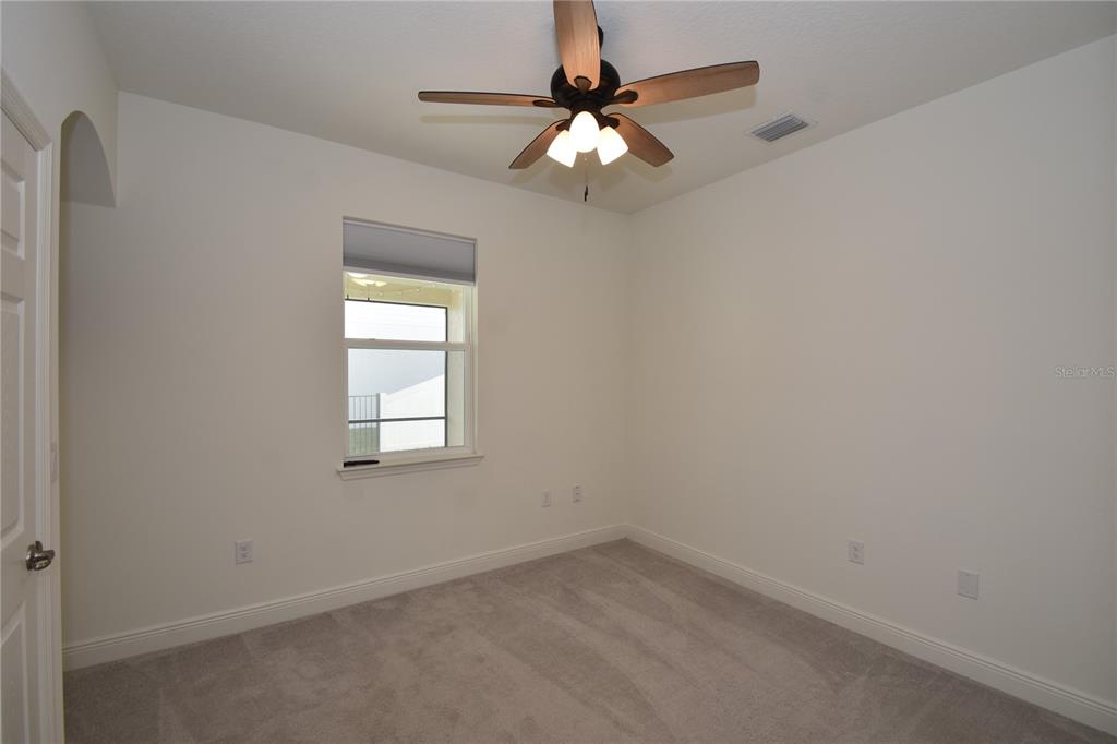 59 Oakleaf Way Palm Coast, FL 32137 - Photo 29 of 39 an empty room with a window