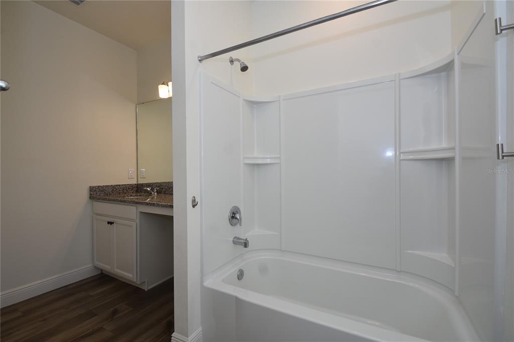 59 Oakleaf Way Palm Coast, FL 32137 - Photo 35 of 39 a bathroom with a bathtub and a sink