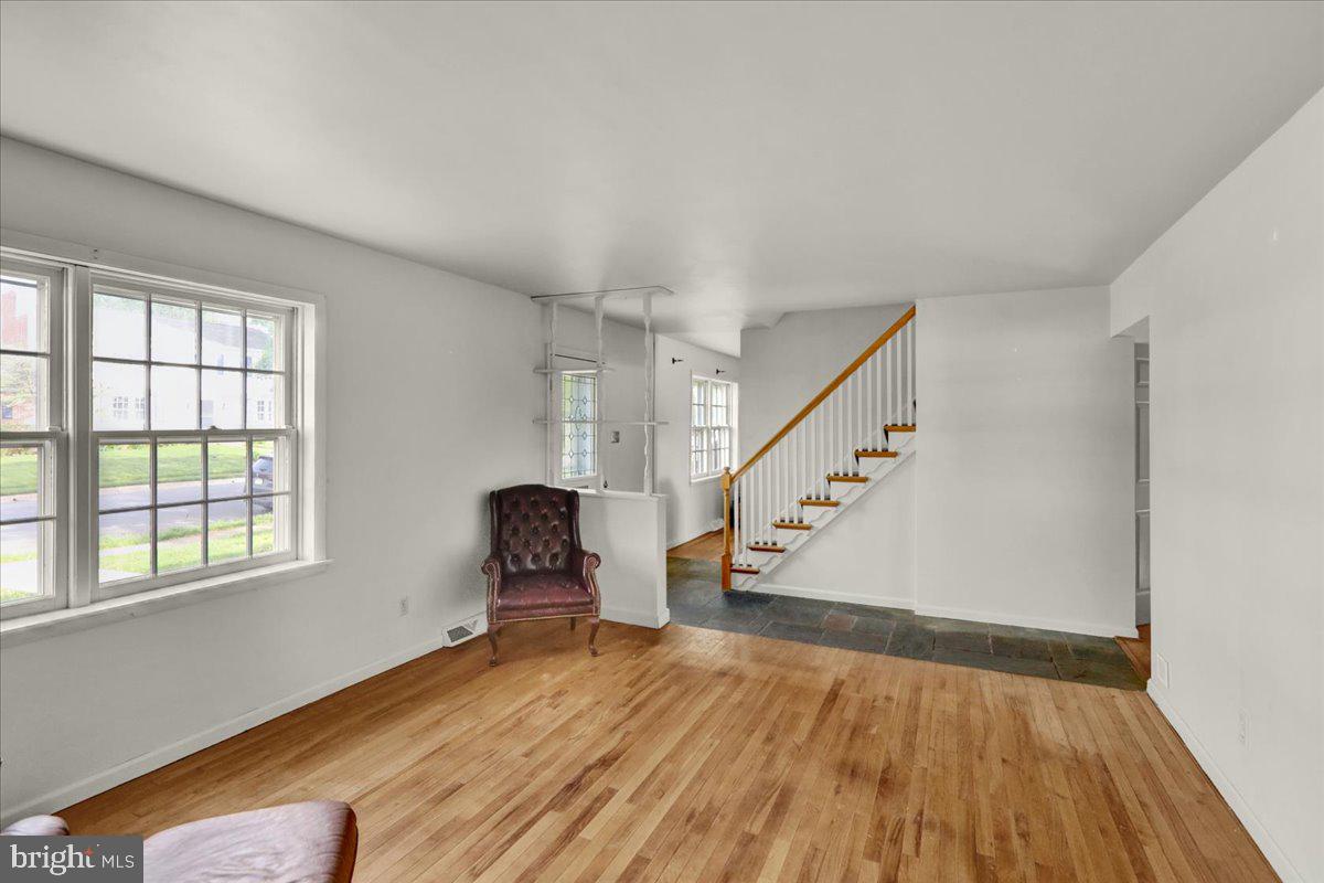 2701 Dalin Drive Reading, PA 19609 - Photo 13 of 34 a view of empty room with wooden floor and fan
