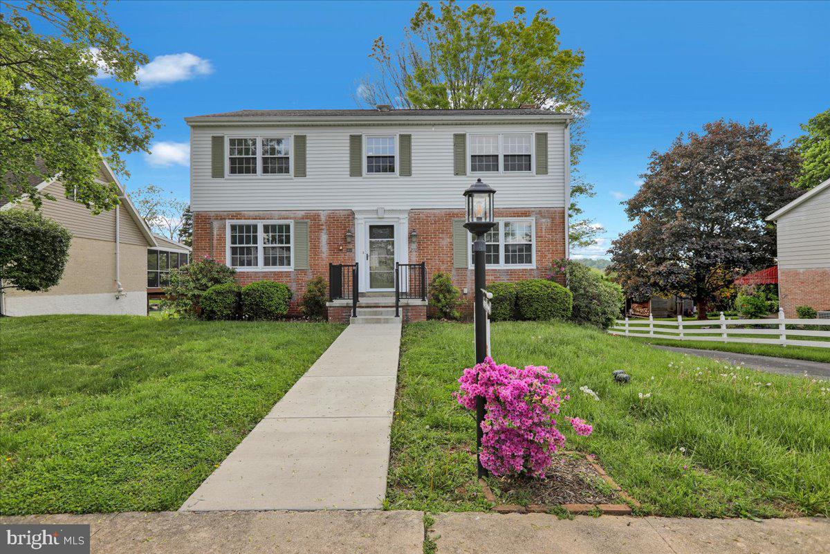 2701 Dalin Drive Reading, PA 19609 - Photo 2 of 34 a front view of a house with a yard