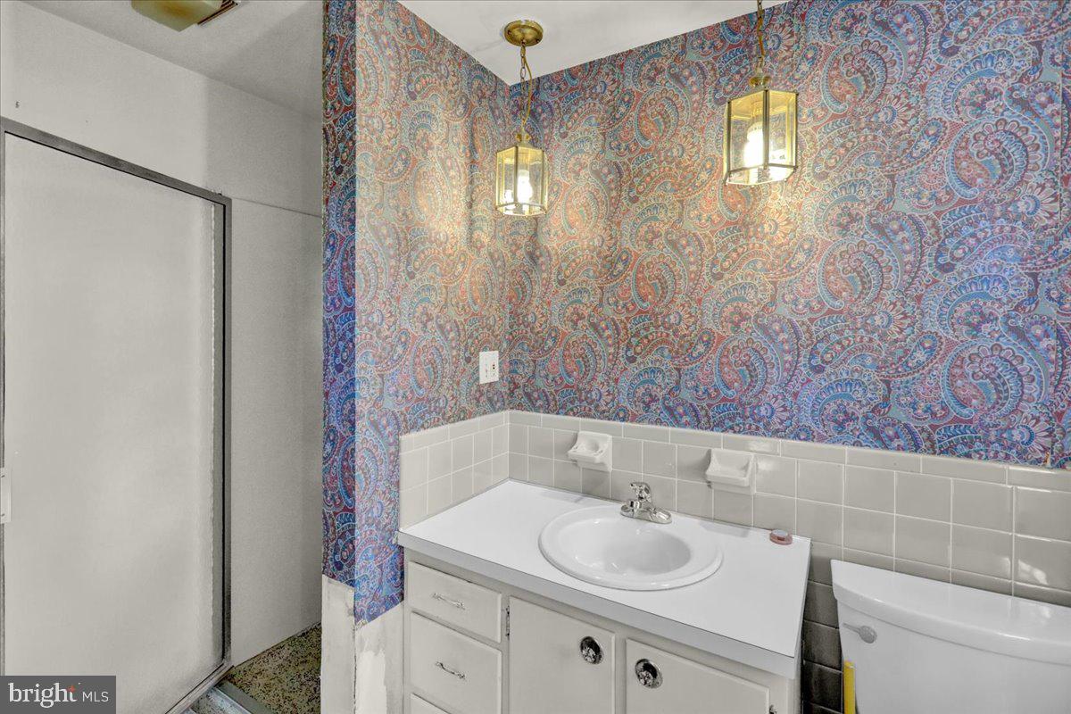 2701 Dalin Drive Reading, PA 19609 - Photo 29 of 34 a bathroom with a sink and a mirror