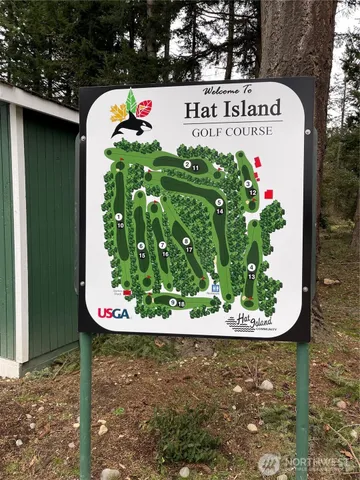 a view of a sign in front of a house