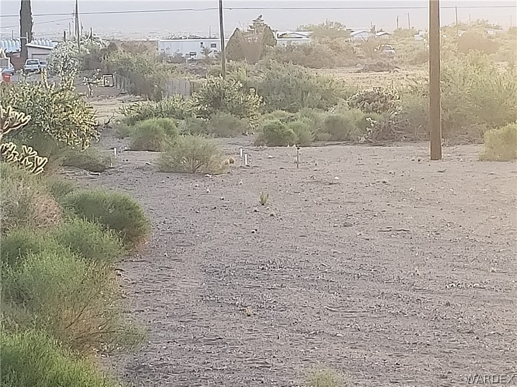 Tbd North Bryce Road Golden Valley, AZ 86413 - Photo 5 of 15 a view of a road from a yard