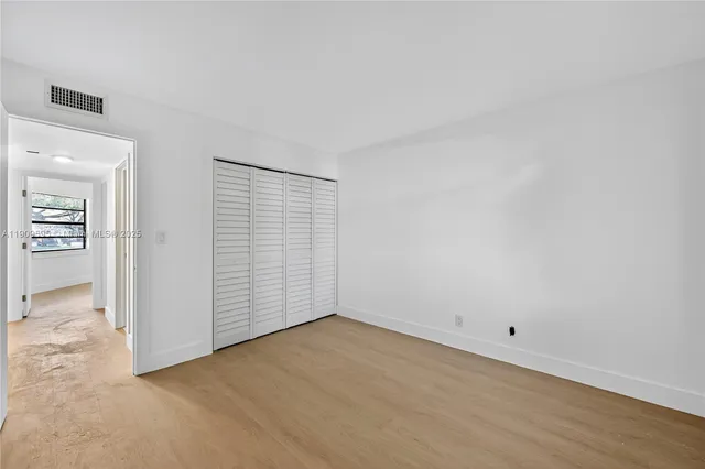 an empty room with closet