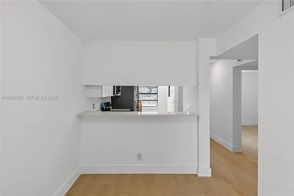 a view of kitchen and microwave