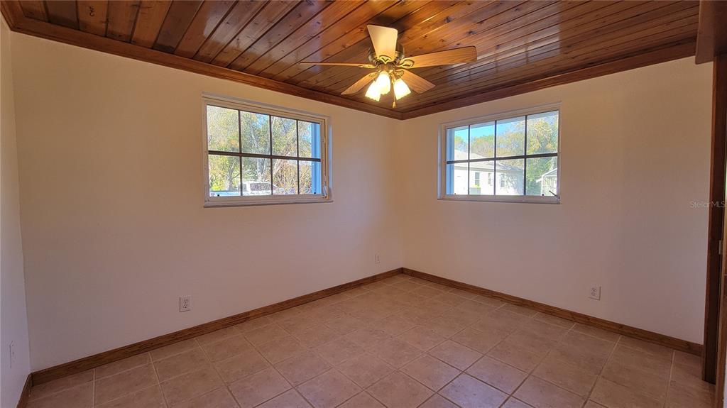 5847 Venisota Road Venice, FL 34293 - Photo 16 of 29 a view of an empty room with a window