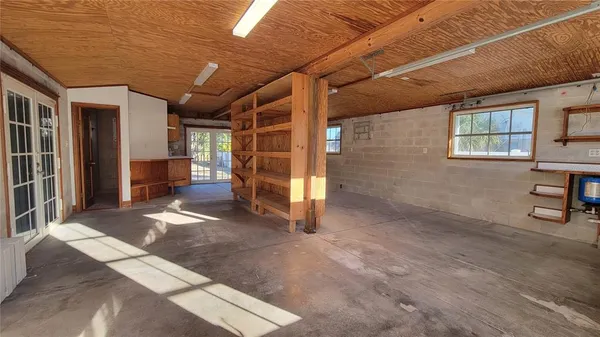 a view of a room with wooden walls