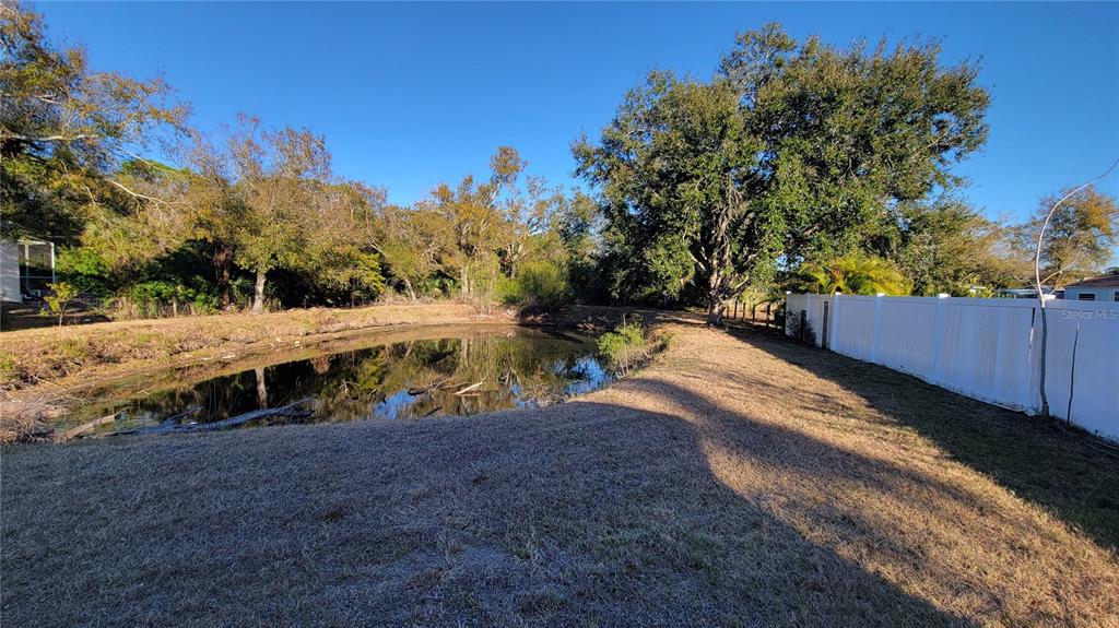 5847 Venisota Road Venice, FL 34293 - Photo 27 of 29 a view of a house with a yard