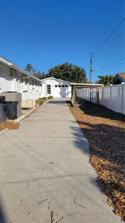 a view of a swimming pool with a chair