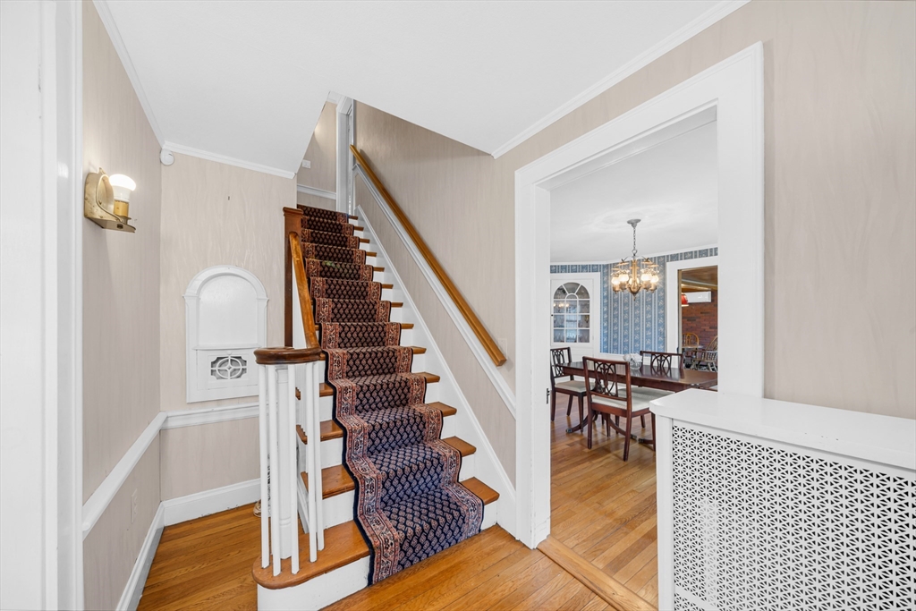 293 Florence Road Waltham, MA 02453 - Photo 19 of 41 a view of entryway and hall with wooden floor